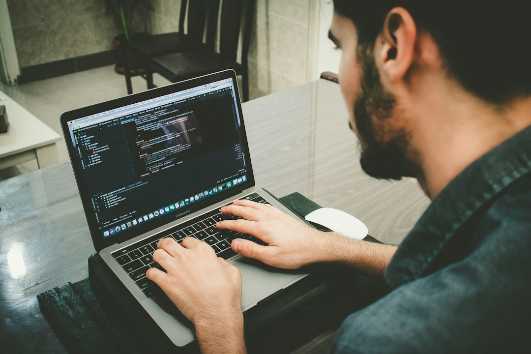 Developer editing wp-config.php code to fix WordPress White Screen of Death