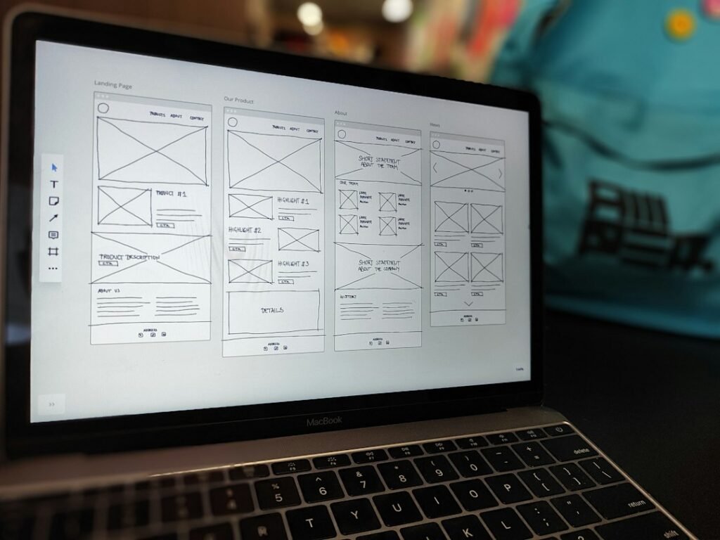 Website wireframe layout on a laptop screen representing sidebar drop error